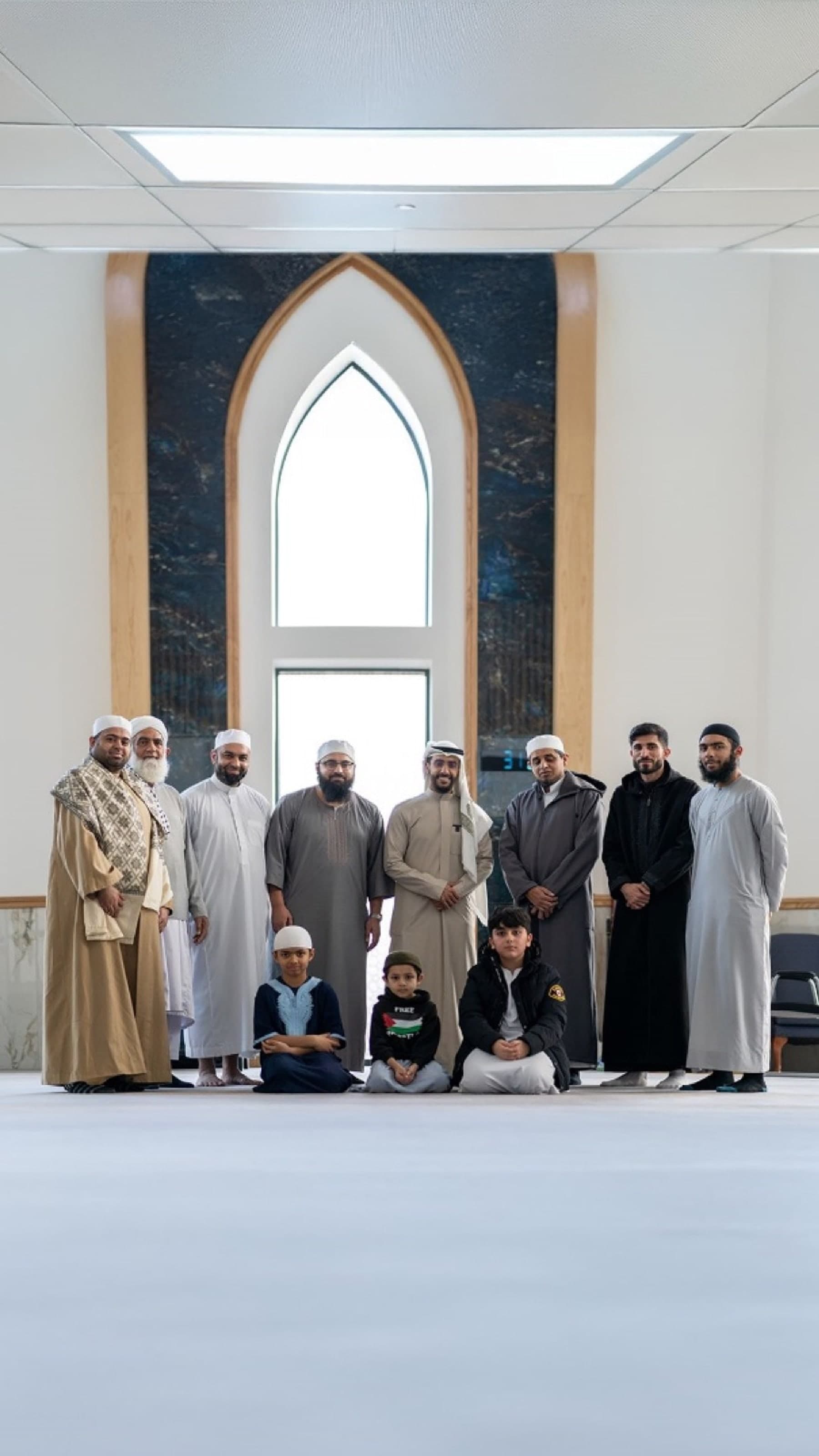 The One Path Events team and community gathered in a mosque